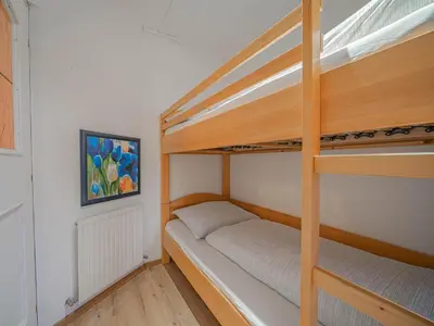 Ein Bett oder Betten in einem Zimmer der Unterkunft Apartment in Brixental near Hiking Trails