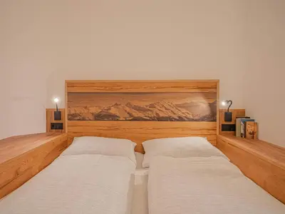 Ein Bett oder Betten in einem Zimmer der Unterkunft Apartment in Brixental near Hiking Trails