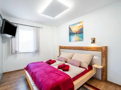 Ein Bett oder Betten in einem Zimmer der Unterkunft Chalet in Neukirchen near Ski Arena Wildkogel