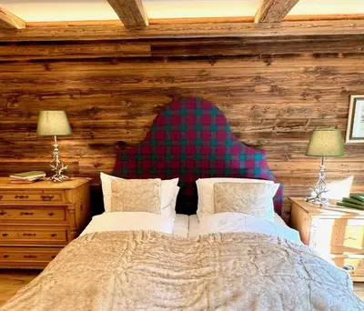 Ein Bett oder Betten in einem Zimmer der Unterkunft Mountain Suites by Belle-Stay