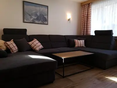 Ein Sitzbereich in der Unterkunft Appartements Binderhof