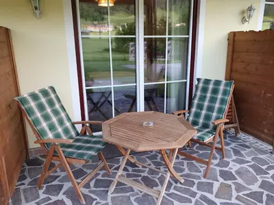 Ein Sitzbereich in der Unterkunft Romantik Pension Lehrberg