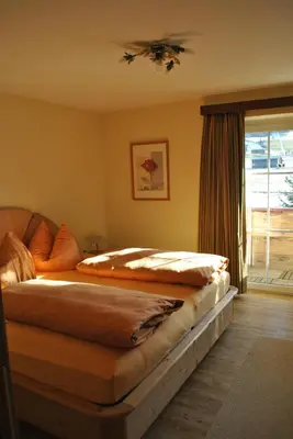 Ein Bett oder Betten in einem Zimmer der Unterkunft Romantik Pension Lehrberg