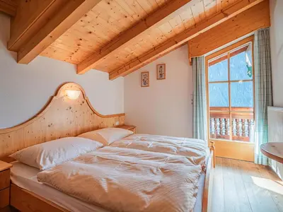 Ein Bett oder Betten in einem Zimmer der Unterkunft Andre XL