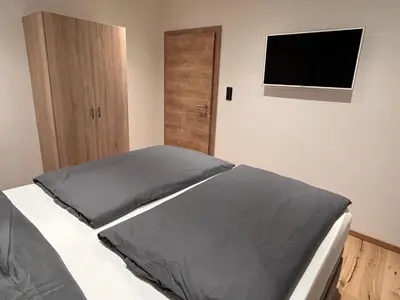 Ein Bett oder Betten in einem Zimmer der Unterkunft Ferienwohnung Felben