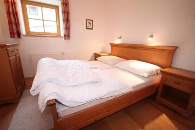 Ein Bett oder Betten in einem Zimmer der Unterkunft Ferienwohnung Königsleiten 37 - Top 1
