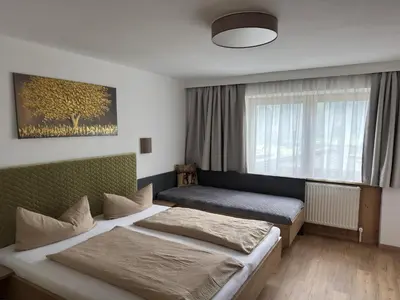 Ein Bett oder Betten in einem Zimmer der Unterkunft Binder's Saghaus