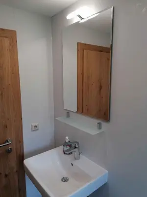 Ein Badezimmer in der Unterkunft Apartments in Bruck am Ziller - Zillertal 857