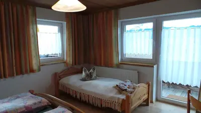 Ein Bett oder Betten in einem Zimmer der Unterkunft Apartments in Bruck am Ziller - Zillertal 857