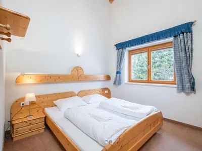 Ein Bett oder Betten in einem Zimmer der Unterkunft Reiterblick Ski in - Ski Out