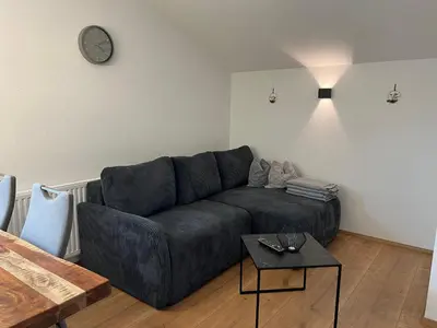Ein Sitzbereich in der Unterkunft Apartment Julia