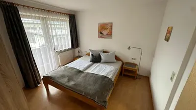 Ein Bett oder Betten in einem Zimmer der Unterkunft Gästehaus Garber