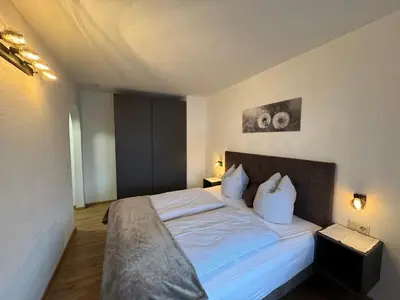 Ein Bett oder Betten in einem Zimmer der Unterkunft Gästehaus Garber