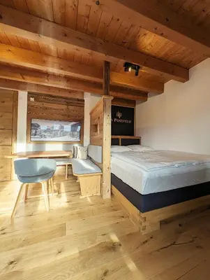 Ein Bett oder Betten in einem Zimmer der Unterkunft Das Postfeld Appartement