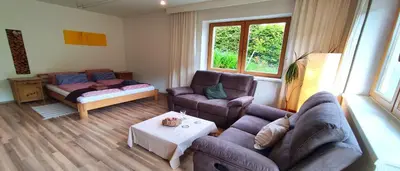 Ein Sitzbereich in der Unterkunft Oberachen Apartment