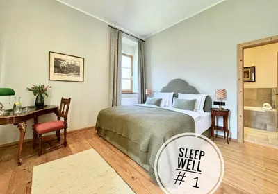 Ein Bett oder Betten in einem Zimmer der Unterkunft TURM KAPS Luxury home direkt am Golfplatz by Belle Stay
