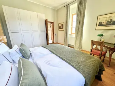 Ein Bett oder Betten in einem Zimmer der Unterkunft TURM KAPS Luxury home direkt am Golfplatz by Belle Stay