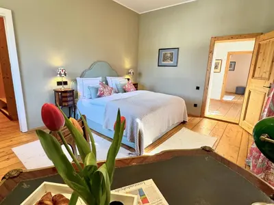 Ein Bett oder Betten in einem Zimmer der Unterkunft TURM KAPS Luxury home direkt am Golfplatz by Belle Stay