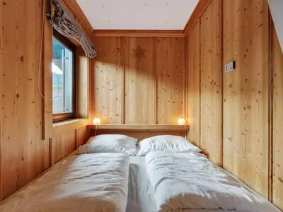 Ein Bett oder Betten in einem Zimmer der Unterkunft Chalet in Jochberg near Wagstätt Lift