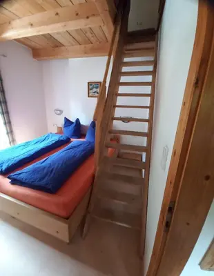 Ein Bett oder Betten in einem Zimmer der Unterkunft Huber