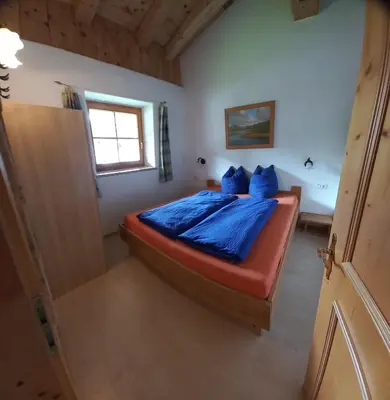 Ein Bett oder Betten in einem Zimmer der Unterkunft Huber