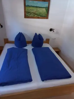 Ein Bett oder Betten in einem Zimmer der Unterkunft Huber