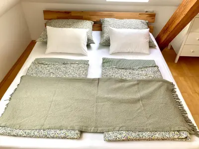 Ein Bett oder Betten in einem Zimmer der Unterkunft Villa Riedhart