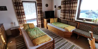 Ein Bett oder Betten in einem Zimmer der Unterkunft Apartment Alpenblick