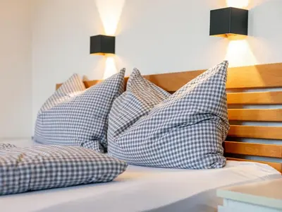 Ein Bett oder Betten in einem Zimmer der Unterkunft Seppen Top 2