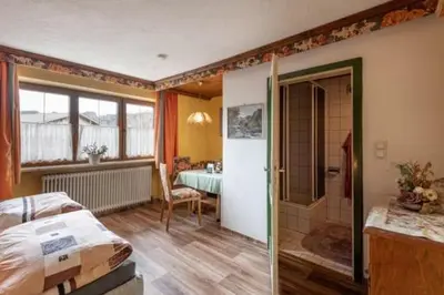 Ein Bett oder Betten in einem Zimmer der Unterkunft Ferienwohnung Dobner Schlössl