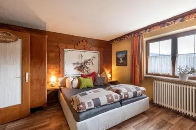 Ein Bett oder Betten in einem Zimmer der Unterkunft Ferienwohnung Dobner Schlössl