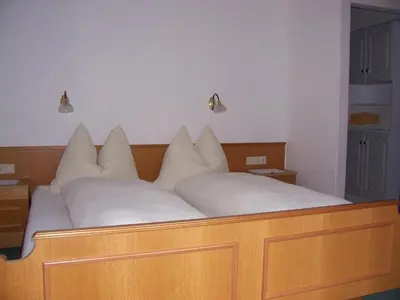 Ein Bett oder Betten in einem Zimmer der Unterkunft Haus Emberger