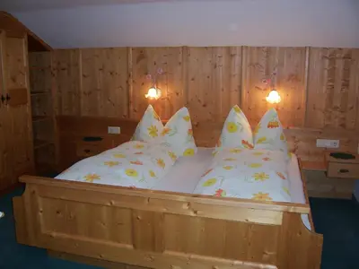 Ein Bett oder Betten in einem Zimmer der Unterkunft Haus Emberger