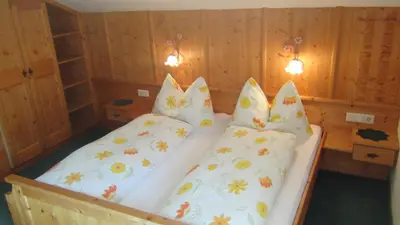 Ein Bett oder Betten in einem Zimmer der Unterkunft Haus Emberger