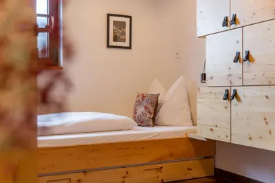 Ein Bett oder Betten in einem Zimmer der Unterkunft Chalet Edelweiss