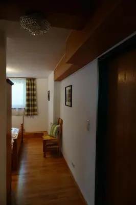 Ein Bett oder Betten in einem Zimmer der Unterkunft Apartmentpension Hillebrand