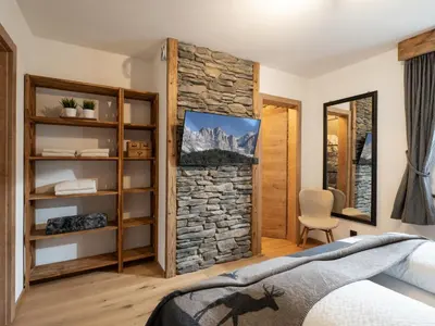 Ein Bett oder Betten in einem Zimmer der Unterkunft Alpine Lodge Brixen