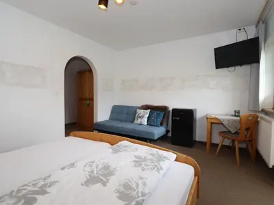 Ein Bett oder Betten in einem Zimmer der Unterkunft Anderla 2