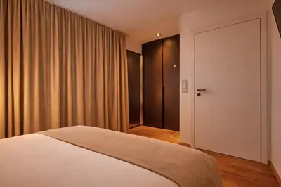 Ein Bett oder Betten in einem Zimmer der Unterkunft HEAVEN 7 Suite - by AlpenLuxus Collection