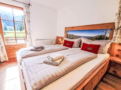 Ein Bett oder Betten in einem Zimmer der Unterkunft Apartment Almidylle by Interhome
