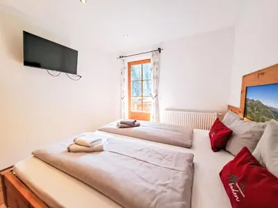 Ein Bett oder Betten in einem Zimmer der Unterkunft Apartment Almidylle by Interhome