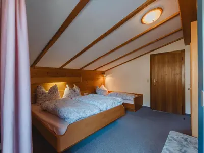 Ein Bett oder Betten in einem Zimmer der Unterkunft Apartment Wildkogel 2 by Interhome