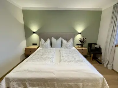 Ein Bett oder Betten in einem Zimmer der Unterkunft Apartment Chalet Holzerjuwel by Interhome
