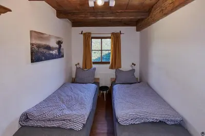 Ein Bett oder Betten in einem Zimmer der Unterkunft Zum Seifensieder