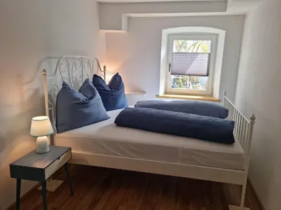 Ein Bett oder Betten in einem Zimmer der Unterkunft Kapellenblick! geräumiges Apartment