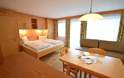 Ein Bett oder Betten in einem Zimmer der Unterkunft Gästehaus Waltl