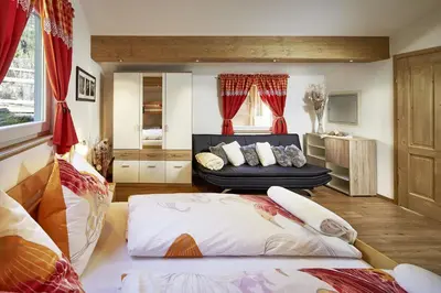 Ein Bett oder Betten in einem Zimmer der Unterkunft Chalet Aichner