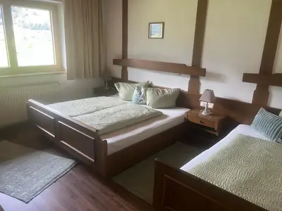 Ein Bett oder Betten in einem Zimmer der Unterkunft Apart Bergblick