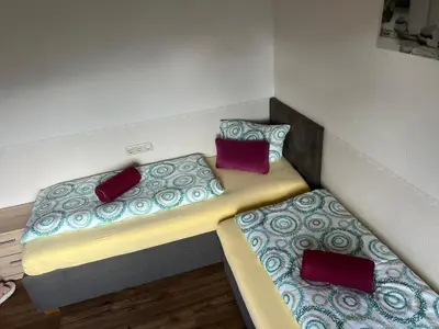 Ein Bett oder Betten in einem Zimmer der Unterkunft Apart Bergblick