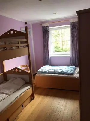 Ein Bett oder Betten in einem Zimmer der Unterkunft Ferienwohnung Kristin Brixen im Thale